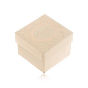 Dárková krabička v béžovém odstínu, ornamenty a nápis zlaté barvy