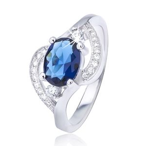 Stříbrný prsten 925 s oválným modrým zirkonem, zvlněná ramena - Velikost: 57